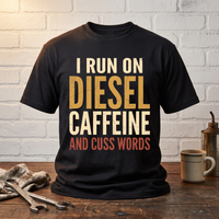 Load image into Gallery viewer, Diesel Caffeine And Cuss Words mechanic t-shirt on a workbench with wrenches and coffee
